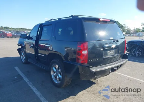 2009 Chevrolet Tahoe Ltz from USA, damaged, VIN 1GNFK33219J114669
